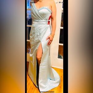 Very elegant light blue satin dress with pearly